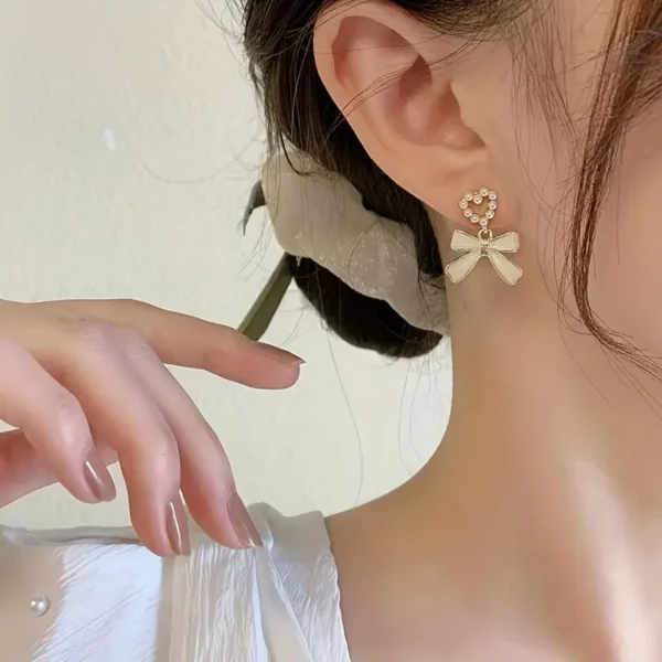 Elegant Bow Heart-Shaped Artificial Pearl Earrings for Women – Alloy Fashion Jewelry (Pakistan)